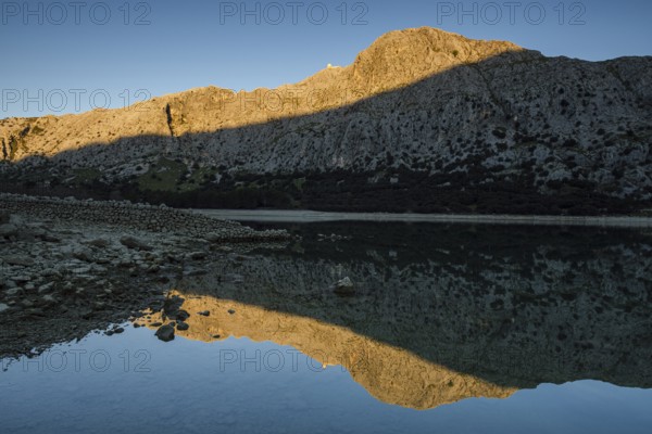 Gorg Blau reservoir, sunrise lighting, Puig de Ses Vinyes and Puig Major, Escorca, Majorca,