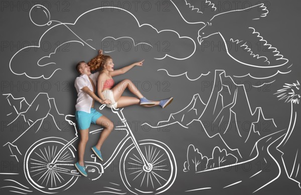 Happy Valentine's Day love story concept of a romantic couple on chalk drawings background of