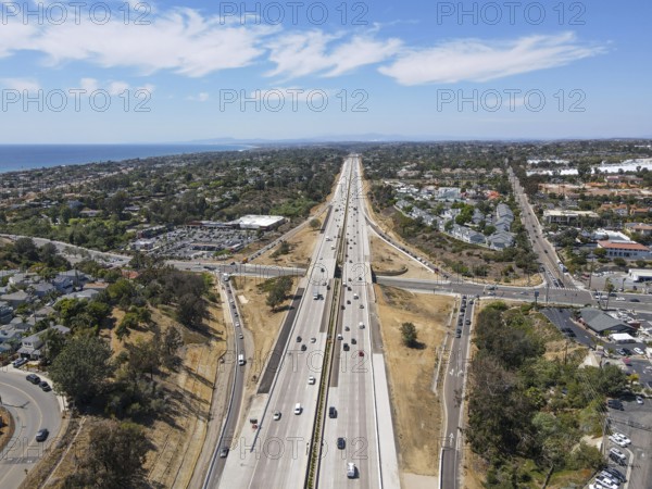 Aerial view of highway transportation with small traffic, highway interchange and junction, San