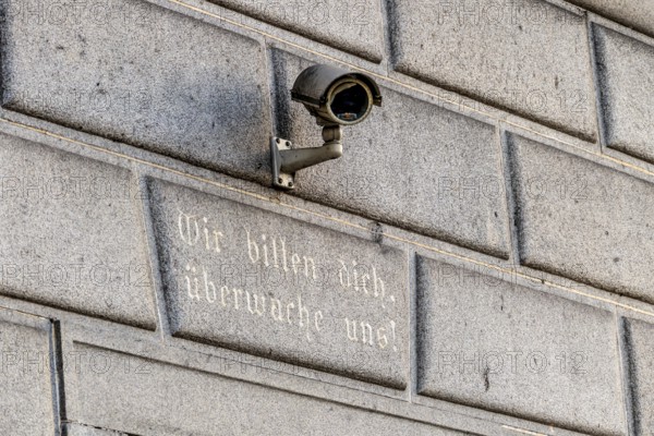 Surveillance camera on a building, symbol for surveillance, internal security, control, data