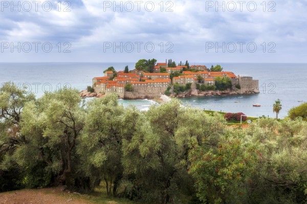 Sveti Stefan island in Montenegro resort at Adriatic sea, high angle view. Famous travel