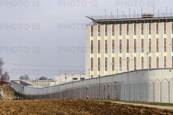 Stammheim prison, JVA. Exterior view with prison wall and barbed wire. Stuttgart,
