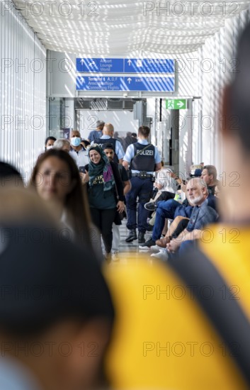Police and people at Munich Airport, Bavaria, Germany
