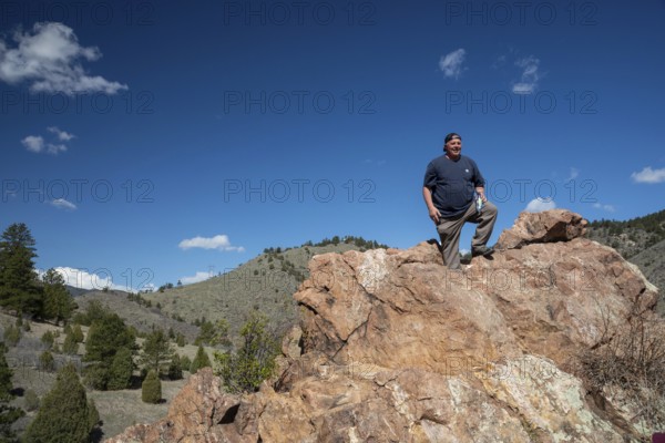 Idledale, Colorado - A hiker stands at a high point on the Bruin Bluff Trail in Lair o' the Bear