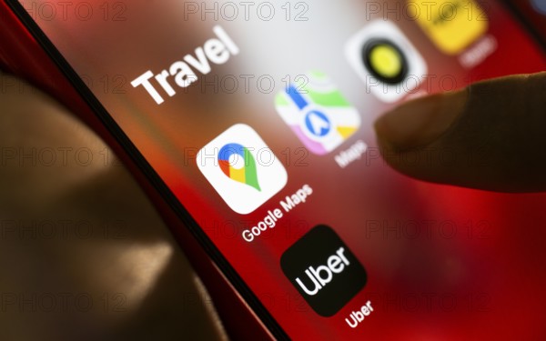 In this photo Illustration a person browsing taps Google maps application on a tablet device on 24