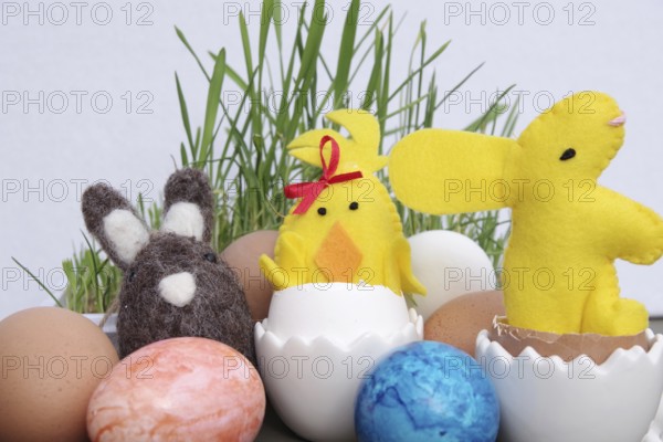 Easter, Easter decoration, Easter egg, Easter bunny, colourful, Coloured eggs and figures lie