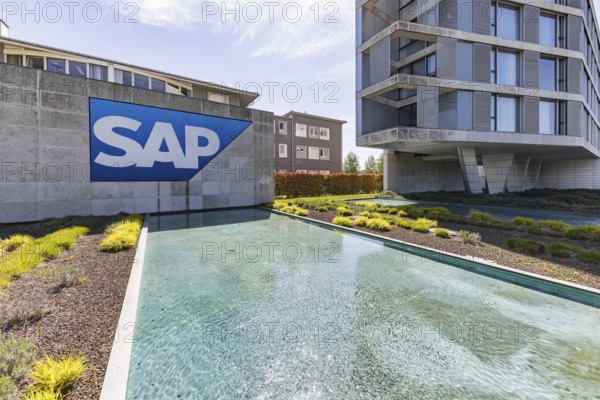 Logo and building of the listed software company SAP, headquarters. Walldorf, Baden-Württemberg,