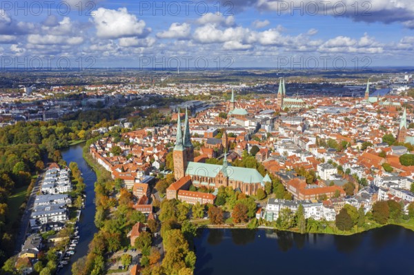 Aerial view over the river Trave and church towers in the old town of the Hanseatic City of Lübeck