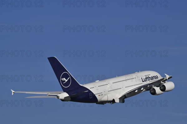 Lufthansa Airbus A380-800 taking off with blue sky and clouds, Runway North, Munich Airport, Upper