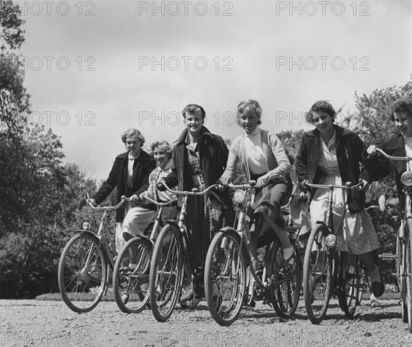 1950s cyclists. A group of young women on their bicycles. Swedish princess Birgitta far left.