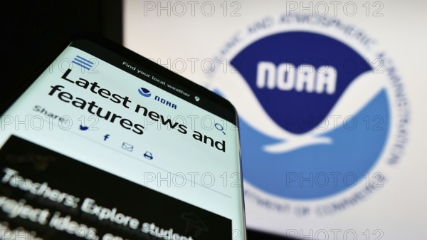 Stuttgart, Germany, 10-09-2022: Mobile phone with website of National Oceanic and Atmospheric