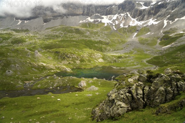 The Lacs des Aires lake in the Cirque de Troumouse basin in the Pyrenees National Park near