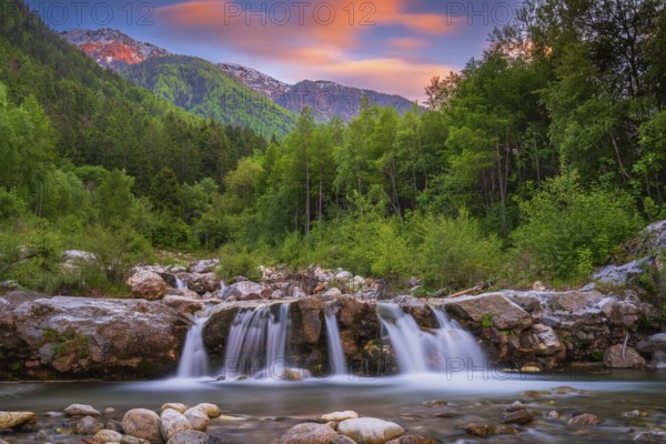 View of a waterfall of the Rio Plima stream in the evening light, long exposure, landscape photo,