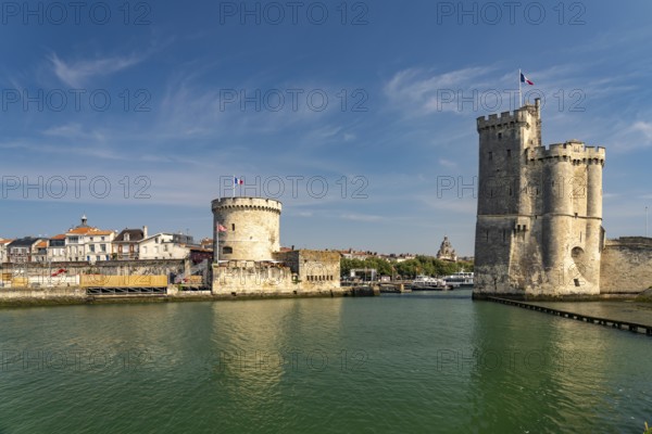 Harbour entrance to the old Vieux Port with the medieval towers Tour St.-Nicolas and Tour de la