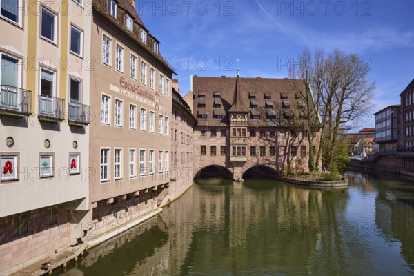 Heilig-Geist-Spital, historic hospital, pharmacy, river Pegnitz, historic buildings, facade,