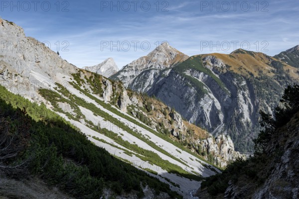 Narrow mountain valley, view of autumnal mountain landscape with mountain peaks Sonnjoch and