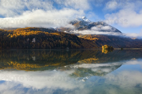 Fog over Lake Sils with Piz da la Margna in the background, Upper Engadine, Canton Graubünden,