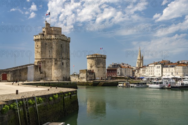 Harbour entrance to the old Vieux Port with the medieval towers Tour St.-Nicolas, Tour de la