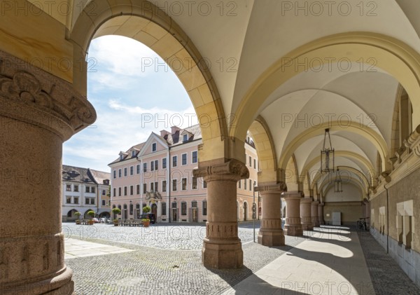 View of Hotel Börse through the arches of the New Town Hall of Görlitz, Lower Market Square -