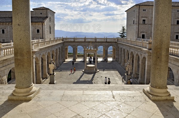 Bramante cloister with cistern and statues of St Benedict and St Scholastica of Nursia, Benedictine