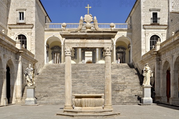 Bramante cloister with cistern and statues of St Benedict and St Scholastica of Nursia, Benedictine