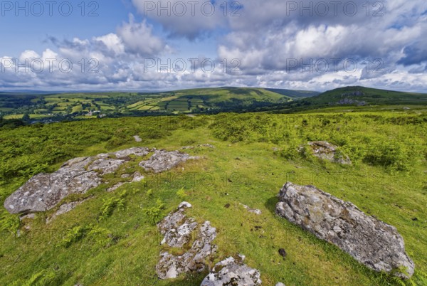 Stones and landscape at the top Tor tor rock hill in Dartmoor National Park. Widecombe-in-the-Moor,