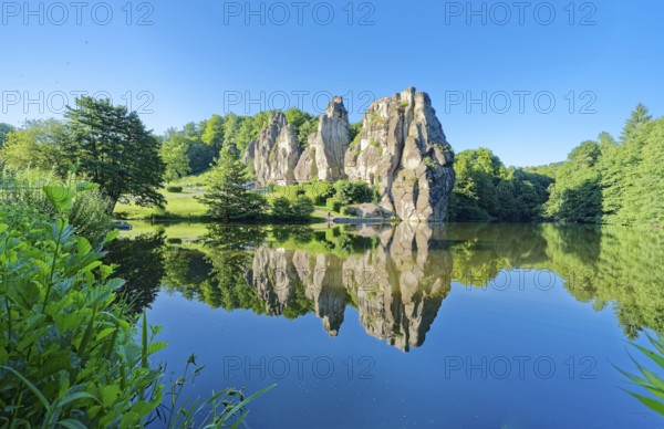 The Externsteine, a sandstone rock formation around 40 metres high in the Teutoburg Forest, are a