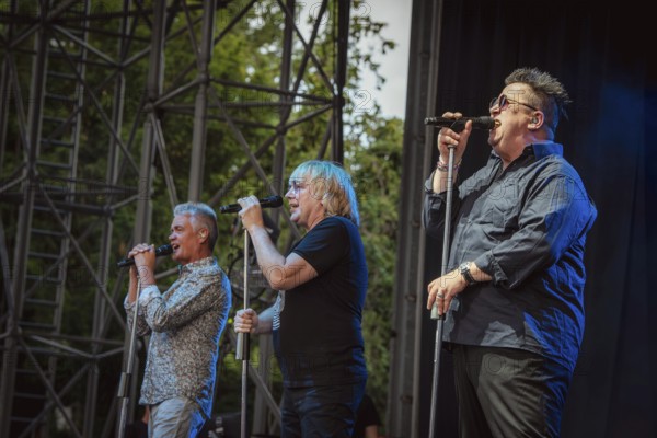 Jens Sembdner, Tobias Künzel and Sebastian Krumbiegel, singer of the band Die Prinzen at the