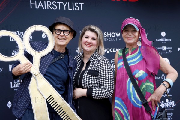 Rolf Scheider, Janine Becker and Barbara Engel at the VIP opening of the new Deinhard Salon Am