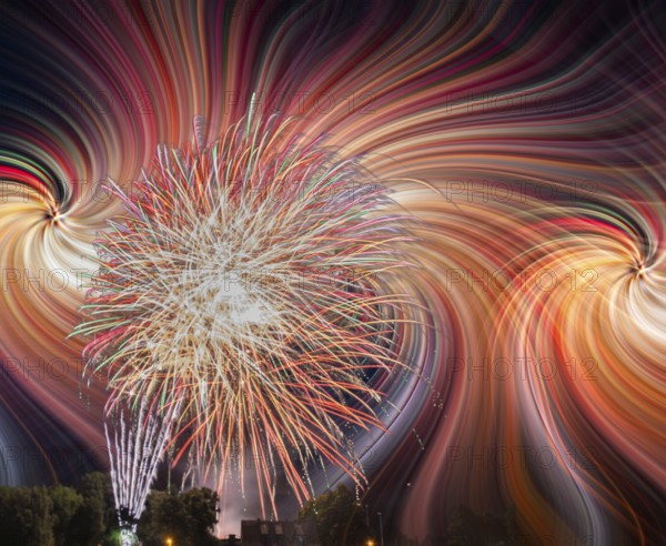 Colorfull fireworks display on the night sky with twirl effect