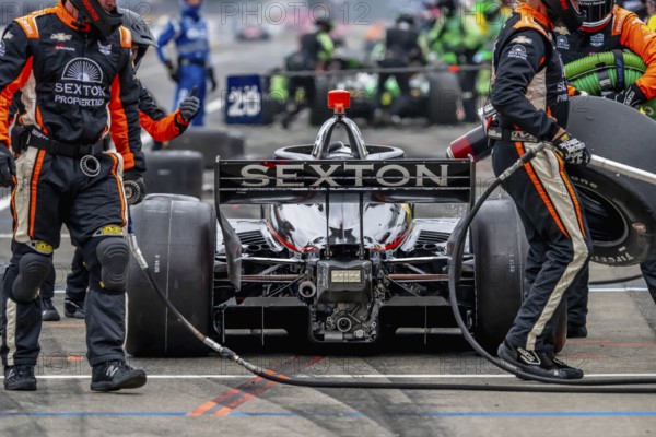 INDYCAR Series driver, SANTINO FERRUCCI (14) of Woodbury, Connecticut, brings his car in for