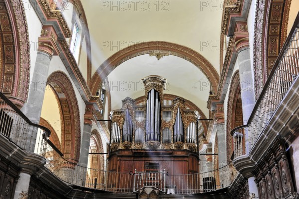 Oaxaca, Mexico, Central America, Baroque organ in a church with richly decorated pipes and wooden