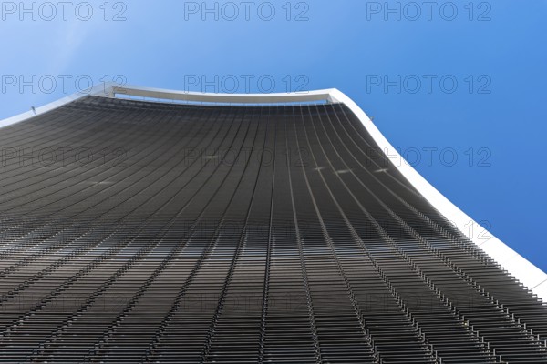 London, UK, May 14, 2019: Low angle view of 20 Fenchurch skyscraper in London agaisnt blue sky.