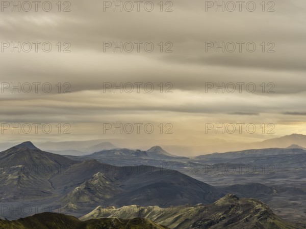 View from Mount Sveinstindur, volcanic landscape, moss-covered hills, mountains, Icelandic