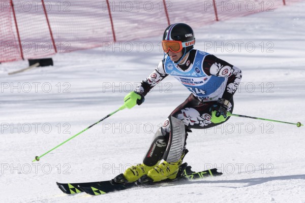 Mount skier Zhuravchenko Stepan Krasnodar Region skiing down. Russian Alpine Skiing Championship,