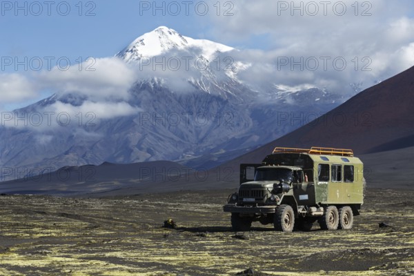 TOLBACHIK VOLCANO, KAMCHATKA, RUSSIA, AUG 27, 2014: Russian off-road extreme expedition truck
