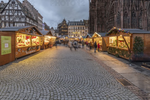 Famous Christmas market on the cathedral square in Strasbourg in Alsace. Health precautions and