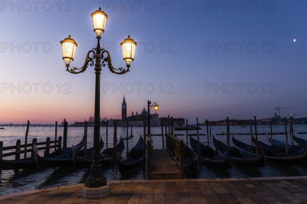 Dawn, Venetian gondolas with the church of San Giorgio Maggiore in the background, Venice, UNESCO