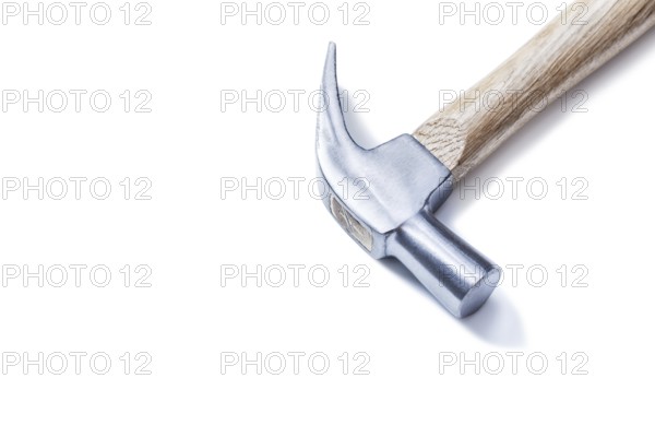 Claw hammer on yellow leather gloves isolated