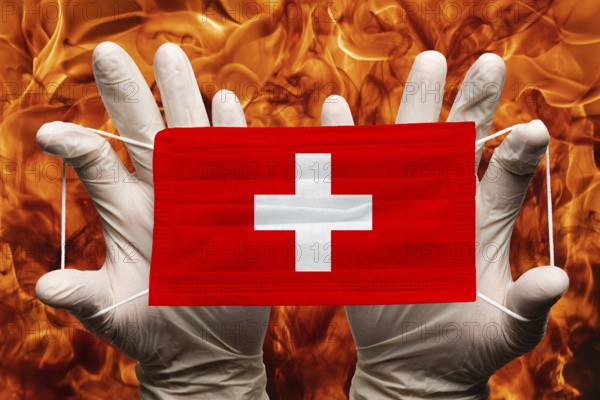 Doctor holding in white gloves protection medical face mask, respiratory bandage with Switzerland