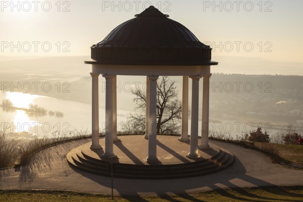 Beautiful temple in a landscape shot. Sunrise on a winter morning. Beautiful view along the Rhine