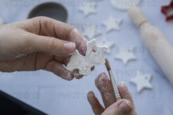 Master class of painting Unrecognizable artist do it yourself air dry clay crafts for Christmas