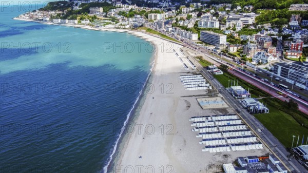 Aerial view on Le Havre Beach with white sand and cityscape: summer begin in normandy! Small white