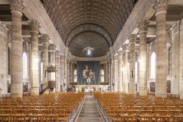 Neoclassical church interior of the Eglise Saint-Louis with monumental columned peristyle of