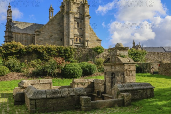 Enclosed parish Gothic church Eglise Saint-Gouesnou and spring of the same name, Gouesnou near