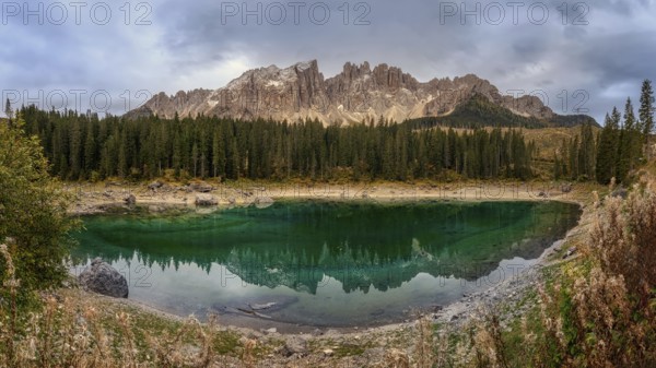 Karersee is located in the Latemarwald forest in the upper part of the Eggental valley, of the city
