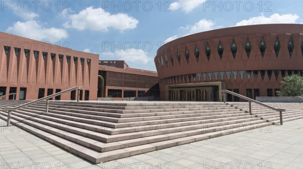 Beijing, China June 1 2018: Green gardens and the Libray Building of the famous Tsinghua University