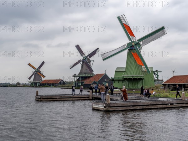 Traditional windmills on the coast Zaan in museum village, Open-air museum Zaanse Schans, Zaanse