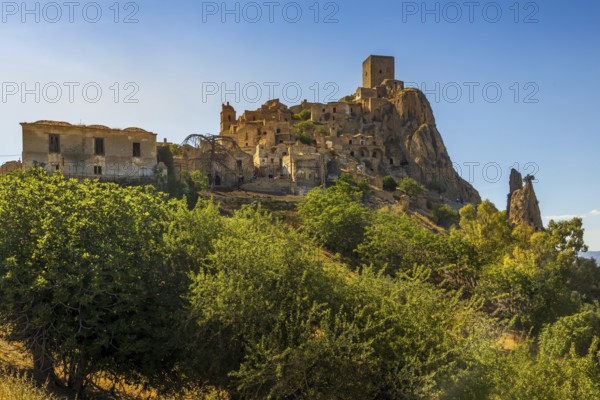 A picturesque view of the abandoned, old mountain town of Craco, built of sandstone rock. Craco is
