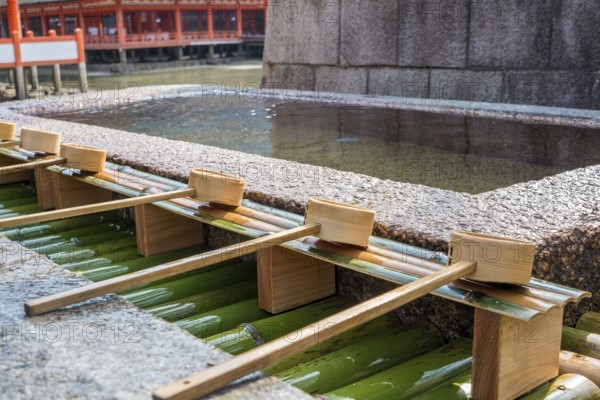 Chozuya with bamboo spoons for ritual purification in the temple